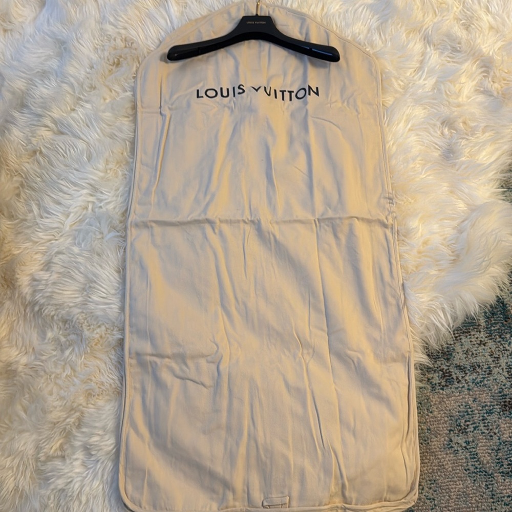 Store fresh authentic Louis Vuitton garment bag and hanger